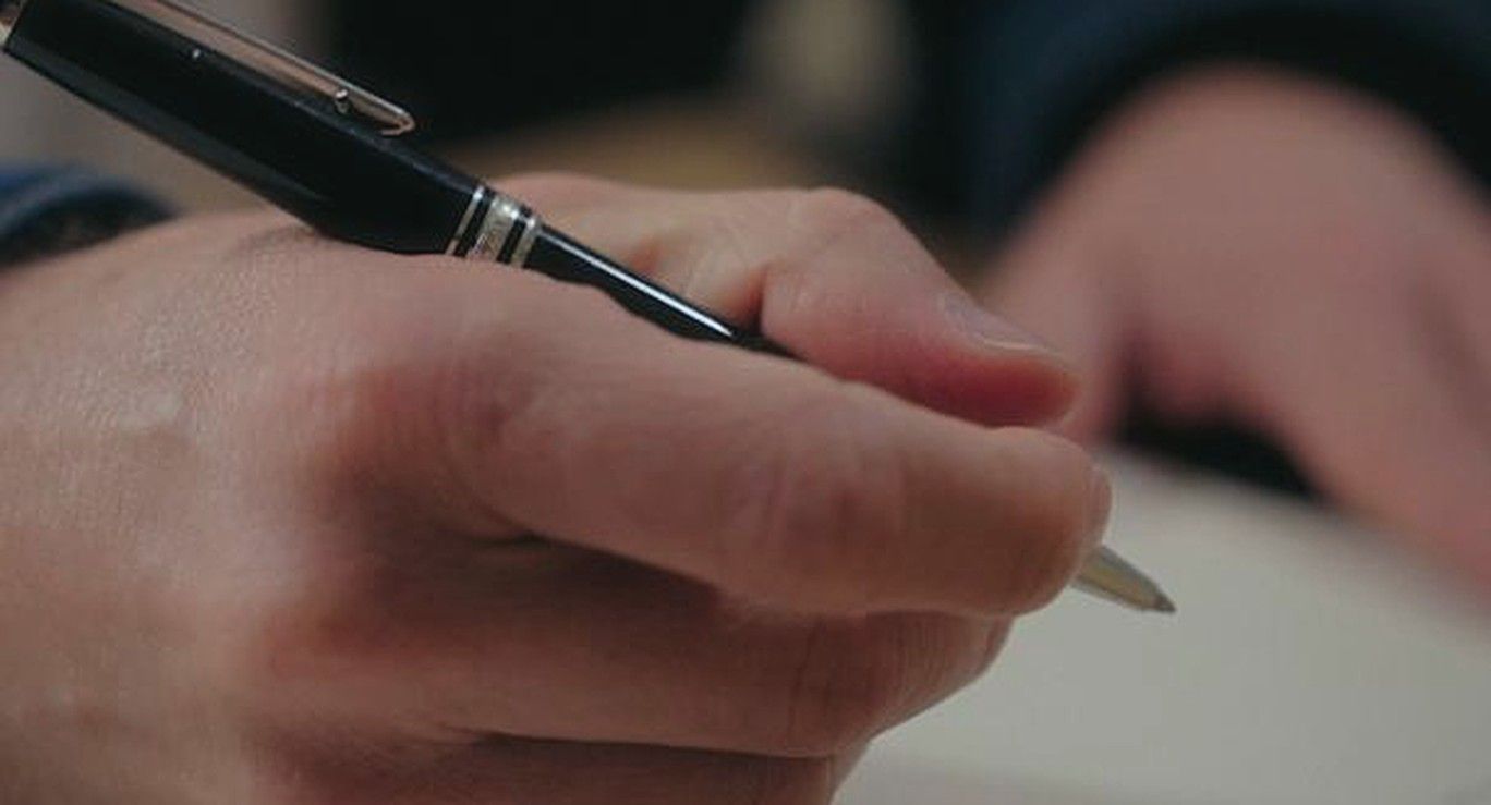 Main qui écrit, atelier de stratégie